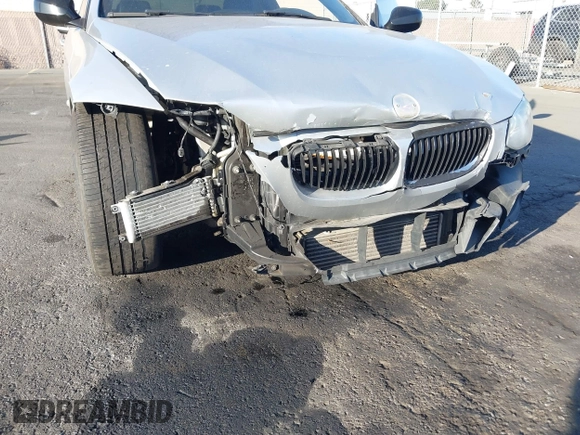 2011 BMW 3 Series 335is with VIN WBAKG1C57BE618727, listed as a IAAI auction lot 41234102 with 154,007 mi miles and . Bid and sale history available at carsss.com. Image 6.