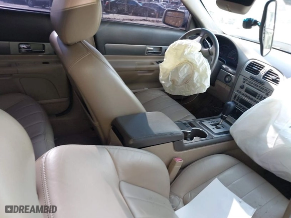 2005 Lincoln LS w/Sport Pkg with VIN 1LNHM87A55Y632128, listed as a IAAI auction lot 38554976 with 1 mi miles. Bid and sale history available at carsss.com. Image 5.