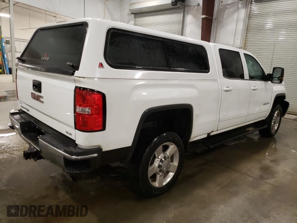 2016 GMC Sierra 2500HD SLE z VIN 1GT12SEG2GF272752, wystawiony jako Copart lot #79693704 z przebiegiem 200 684 mil mil oraz Szkoda całkowita • Salvage title. Historia ofert i sprzedaży dostępna na DreamBid. Obrazek 3.