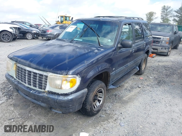 1999 Mercury Mountaineer z VIN 4M2DU52P3XUJ37055, wystawiony jako IAAI lot #41940577 z przebiegiem 218 702 mil mil oraz . Historia ofert i sprzedaży dostępna na DreamBid. Obrazek 2.