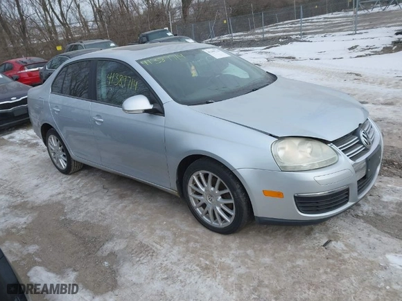 2008 Volkswagen Jetta Sedan Wolfsburg with VIN 3VWRJ71K18M185744, listed as a IAAI auction lot 41389714 with 107,446 mi miles. Bid and sale history available at carsss.com. Image 1.