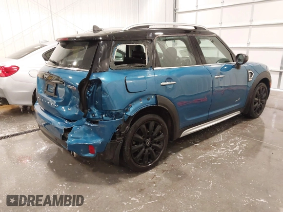 2020 MINI Countryman Cooper S with VIN WMZYX1C01L3L57027, listed as a IAAI auction lot 41270859 with 38,150 mi miles and . Bid and sale history available at DreamBid. Image 4.