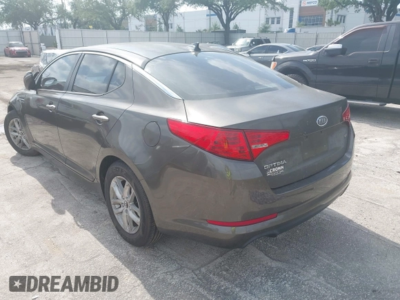 2011 Kia Optima LX with VIN KNAGM4A70B5162915, listed as a IAAI auction lot 42094325 with 156,169 mi miles and . Bid and sale history available at carsss.com. Image 3.
