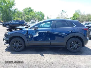 2024 Mazda CX-30 S Select Sport with VIN 3MVDMBBM2RM657781, listed as a IAAI auction lot 42297311 with 13,677 mi miles and . Bid and sale history available at DreamBid. Image 14.