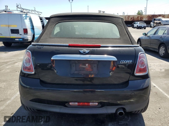 2015 MINI Convertible with VIN WMWZN3C56FT266838, listed as a Copart auction lot 50250745 with 60,331 mi miles and Salvage title. Bid and sale history available at DreamBid. Image 6.