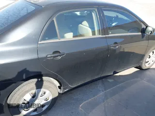 2012 Toyota Corolla L with VIN 5YFBU4EE8CP061390, listed as a IAAI auction lot 41872545 with 104,476 mi miles. Bid and sale history available at carsss.com. Image 13.