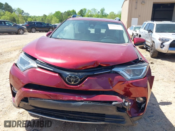 2018 Toyota RAV4 XLE with VIN 2T3WFREVXJW434957, listed as a IAAI auction lot 42002561 with 111,590 mi miles and . Bid and sale history available at carsss.com. Image 12.