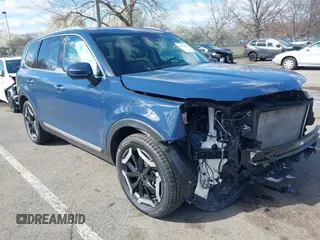 2023 Kia Telluride S z VIN 5XYP64GC7PG366160, wystawiony jako IAAI lot #41973967 z przebiegiem 36 190 mil mil oraz . Historia ofert i sprzedaży dostępna na DreamBid. Obrazek 1.