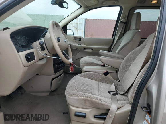 2003 Ford Windstar SE with VIN 2FMDA52413BB59104, listed as a Copart auction lot 55134805 with 132,918 mi miles and Salvage title. Bid and sale history available at DreamBid. Image 7.