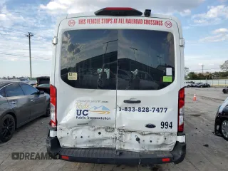 2021 Ford Transit with VIN 1FDAX2CG2MKA23709, listed as a Copart auction lot 74054214 with 105,503 mi miles and Salvage Title. Bid and sale history available at DreamBid. Image 6.