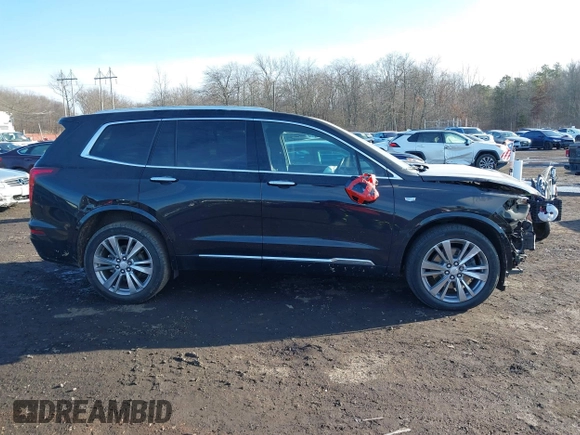 2023 Cadillac XT6 FWD Premium Luxury with VIN 1GYKPCRS1PZ105964, listed as a IAAI auction lot 41525039 with 70,603 mi miles and . Bid and sale history available at DreamBid. Image 13.