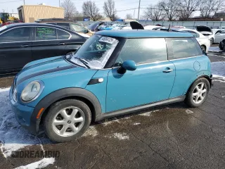 2007 MINI Hardtop with VIN WMWMF33567TT56659, listed as a Copart auction lot 46004125 with 131,849 mi miles and Salvage Title. Bid and sale history available at DreamBid. Image 1.