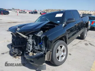 2014 Chevrolet Silverado 1500 LT with VIN 3GCUKREH8EG210945, listed as a IAAI auction lot 41718435 with 106,320 mi miles and . Bid and sale history available at DreamBid. Image 2.