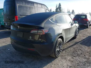 2023 Tesla Model Y Long Range z VIN 7SAYGDEE9PF637042, wystawiony jako IAAI lot #41969086 z przebiegiem 25 524 mil mil oraz . Historia ofert i sprzedaży dostępna na DreamBid. Obrazek 4.