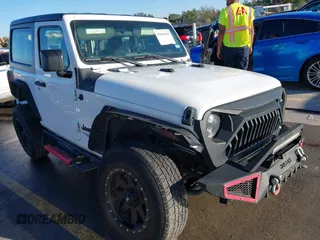 2021 Jeep Wrangler Sport S with VIN 1C4GJXAN2MW663880, listed as a IAAI auction lot 41059915 with 83,867 mi miles and . Bid and sale history available at DreamBid. Image 1.