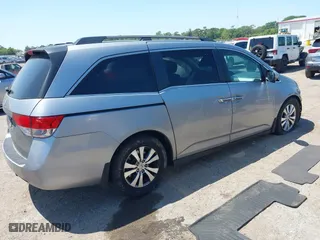 2016 Honda Odyssey EX-L with VIN 5FNRL5H68GB025082, listed as a IAAI auction lot 41994995 with 143,955 mi miles. Bid and sale history available at carsss.com. Image 4.