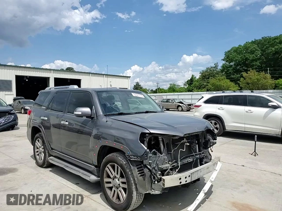 2011 Toyota 4Runner Trail with VIN JTEBU5JRXB5034150, listed as a Copart auction lot 55321715 with 171,022 mi miles and Salvage title. Bid and sale history available at DreamBid. Image 14.