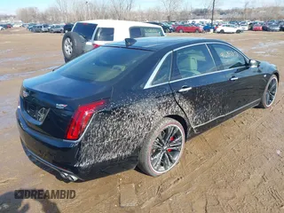 2017 Cadillac CT6 Platinum AWD z VIN 1G6KN5R64HU175275, wystawiony jako IAAI lot #41683802 z przebiegiem 75 604 mil mil oraz . Historia ofert i sprzedaży dostępna na DreamBid. Obrazek 4.