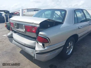 1998 Buick LeSabre Custom with VIN 1G4HP52K1WH412332, listed as a IAAI auction lot 41923320 with 201,306 mi miles. Bid and sale history available at carsss.com. Image 18.