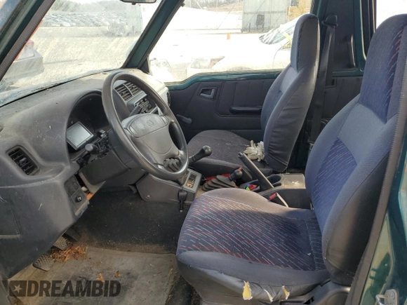 1996 Chevrolet Tracker z VIN 2CNBJ1863T6925397, wystawiony jako Copart lot #50446605 z przebiegiem 139 484 mil mil oraz Czysty tytuł • Clean title. Historia ofert i sprzedaży dostępna na DreamBid. Obrazek 7.