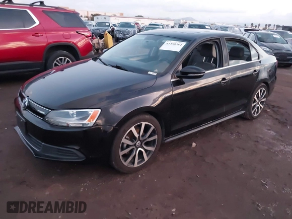 2013 Volkswagen Jetta Hybrid SEL with VIN 3VW637AJ1DM277984, listed as a IAAI auction lot 41450384 with 117,665 mi miles and . Bid and sale history available at DreamBid. Image 2.