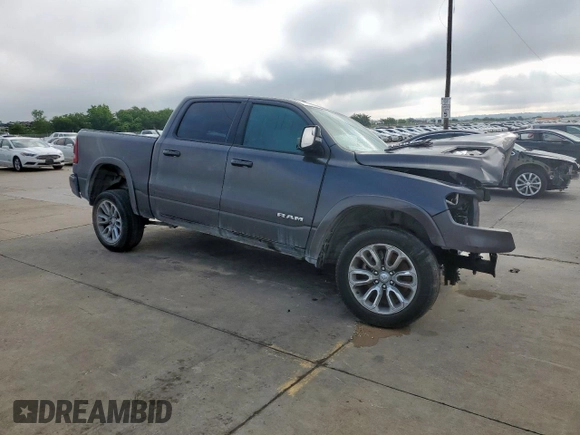 2020 Ram 1500 Laramie with VIN 1C6SRFJT1LN355834, listed as a Copart auction lot 57878305 with Not provided miles and Salvage title. Bid and sale history available at DreamBid. Image 4.