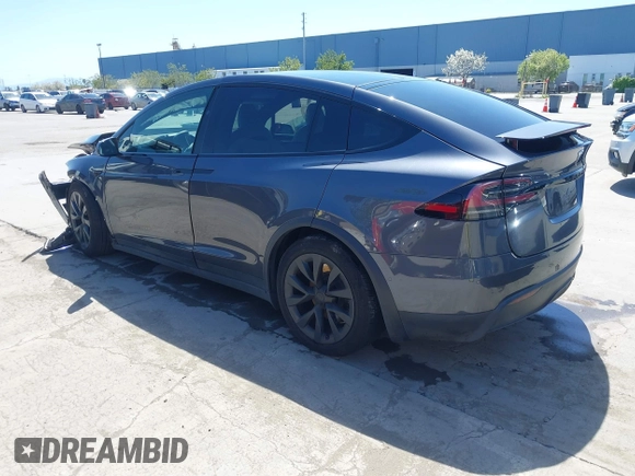 2022 Tesla Model X with VIN 7SAXCAE59NF360301, listed as a IAAI auction lot 41945059 with Not Provided miles and . Bid and sale history available at DreamBid. Image 3.