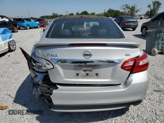 2016 Nissan Altima SV with VIN 1N4AL3AP3GC211653, listed as a Copart auction lot 52870515 with 87,103 mi miles and Salvage Title. Bid and sale history available at carsss.com. Image 6.