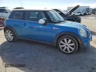 2007 MINI Hardtop S with VIN WMWMF735X7TL92555, listed as a Copart auction lot 46820165 with 98,314 mi miles and Clean Title. Bid and sale history available at DreamBid. Image 4.