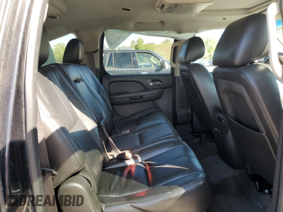 2013 Chevrolet Suburban LT with VIN 1GNSKJE70DR138631, listed as a Copart auction lot 57778185 with 176,934 mi miles and Salvage title. Bid and sale history available at DreamBid. Image 11.