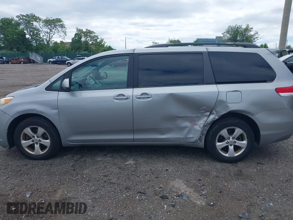2013 Toyota Sienna LE AAS with VIN 5TDKK3DC3DS402574, listed as a IAAI auction lot 42272047 with 142,938 mi miles and . Bid and sale history available at DreamBid. Image 14.