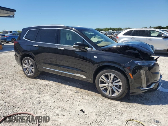 2024 Cadillac XT6 Premium Luxury z VIN 1GYKPERS1RZ755490, wystawiony jako Copart lot #49706575 z przebiegiem 4 239 mil mil oraz Szkoda całkowita • Salvage title. Historia ofert i sprzedaży dostępna na DreamBid. Obrazek 4.