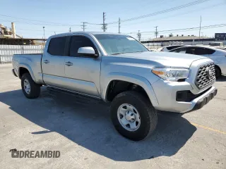 2022 Toyota Tacoma SR5 with VIN 3TMBZ5DN5NM035154, listed as a Copart auction lot 63808825 with 79,928 mi miles and Salvage title. Bid and sale history available at DreamBid. Image 4.