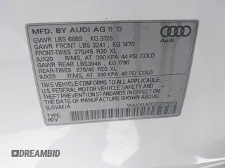 2014 Audi Q7 S line Prestige with VIN WA1DGAFE2ED010013, listed as a IAAI auction lot 42454744 with Not provided miles and . Bid and sale history available at DreamBid. Image 9.
