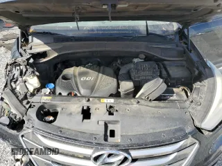 2015 Hyundai Santa Fe z VIN 5XYZU3LB7FG287608, wystawiony jako Copart lot #54870005 z przebiegiem 245 483 mil mil oraz Szkoda całkowita • Salvage title. Historia ofert i sprzedaży dostępna na DreamBid. Obrazek 12.