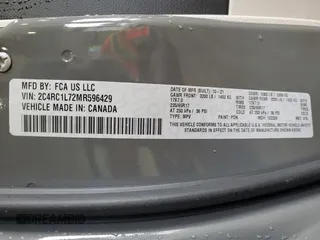 2021 Chrysler Pacifica Hybrid Touring L with VIN 2C4RC1L72MR596429, listed as a Copart auction lot 53859345 with 97,218 mi miles and Salvage title. Bid and sale history available at DreamBid. Image 13.