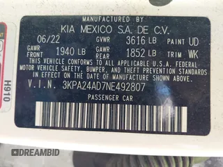 2022 Kia Rio S with VIN 3KPA24AD7NE492807, listed as a IAAI auction lot 42050520 with 100,756 mi miles. Bid and sale history available at carsss.com. Image 9.