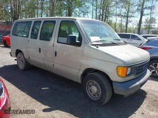 2005 Ford Econoline Wagon XL with VIN 1FMRE11W95HB43678, listed as a IAAI auction lot 42050317 with 68,836 mi miles. Bid and sale history available at carsss.com. Image 1.