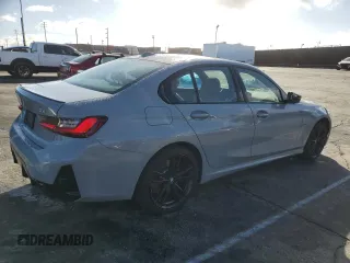 2023 BMW 3 Series 330e with VIN 3MW39FF07P8D26890, listed as a Copart auction lot 45203065 with 21,679 mi miles and Salvage Title. Bid and sale history available at carsss.com. Image 3.