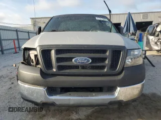 2005 Ford F-150 XL with VIN 1FTRF12235NC10435, listed as a Copart auction lot 57311935 with 249,847 mi miles and Salvage title. Bid and sale history available at DreamBid. Image 5.
