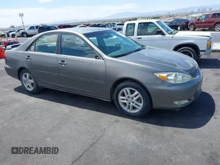 2003 Toyota Camry LE with VIN JTDBE32K130149032, listed as a IAAI auction lot 42063174 with 241,424 mi miles and . Bid and sale history available at DreamBid. Image 15.