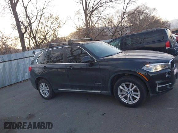 2015 BMW X5 xDrive35i with VIN 5UXKR0C59F0K59728, listed as a IAAI auction lot 41701083 with 83,267 mi miles. Bid and sale history available at carsss.com. Image 13.