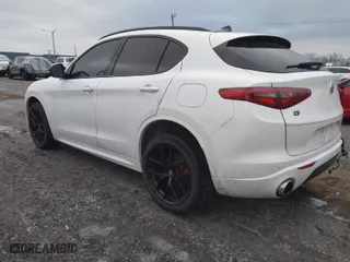 2021 Alfa Romeo Stelvio Ti with VIN ZASPAKBNXM7D15764, listed as a IAAI auction lot 41502764 with 48,714 mi miles. Bid and sale history available at carsss.com. Image 3.
