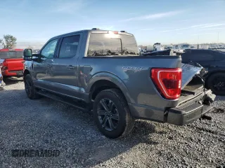 2023 Ford F-150 XL with VIN 1FTEW1EP4PFB38678, listed as a Copart auction lot 43024045 with 8,718 mi miles and Salvage title. Bid and sale history available at DreamBid. Image 2.