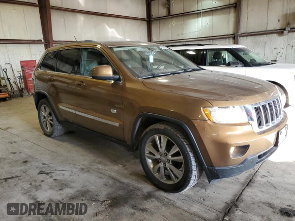 2011 Jeep Grand Cherokee Laredo with VIN 1J4RR4GG6BC675290, listed as a Copart auction lot 47627585 with 142,195 mi miles and Salvage Title. Bid and sale history available at carsss.com. Image 4.
