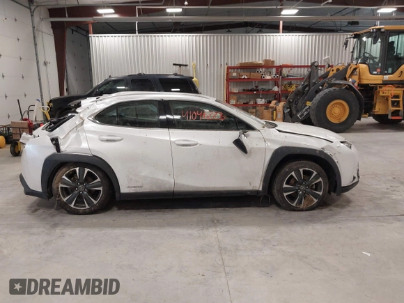 2021 Lexus UX 250h z VIN JTHP9JBHXM2041595, wystawiony jako IAAI lot #41046223 z przebiegiem 27 773 mil mil oraz . Historia ofert i sprzedaży dostępna na DreamBid. Obrazek 14.