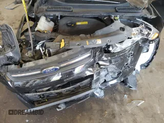 2016 Ford Escape SE z VIN 1FMCU9GXXGUA99014, wystawiony jako Copart lot #56494855 z przebiegiem 37 883 mil mil oraz Szkoda całkowita • Salvage title. Historia ofert i sprzedaży dostępna na DreamBid. Obrazek 11.