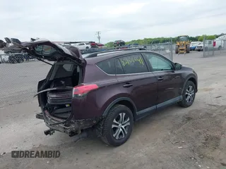 2018 Toyota RAV4 LE with VIN 2T3BFREV9JW771845, listed as a IAAI auction lot 42108641 with 127,394 mi miles. Bid and sale history available at carsss.com. Image 4.