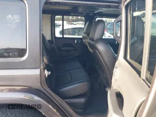 2023 Jeep Wrangler Rubicon with VIN 1C4JJXR67PW662277, listed as a IAAI auction lot 41950065 with 35,714 mi miles and . Bid and sale history available at DreamBid. Image 8.