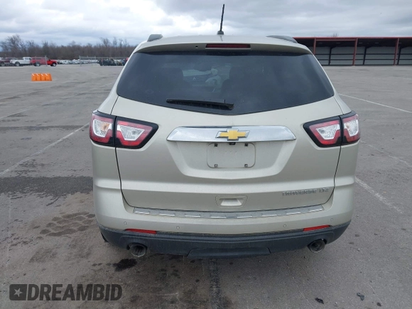 2015 Chevrolet Traverse LTZ z VIN 1GNKRJKD6FJ237851, wystawiony jako IAAI lot #41847524 z przebiegiem 84 809 mil mil oraz . Historia ofert i sprzedaży dostępna na DreamBid. Obrazek 16.